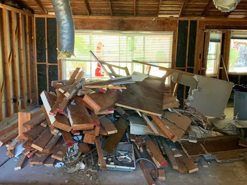 Construction debris loaded for professional removal